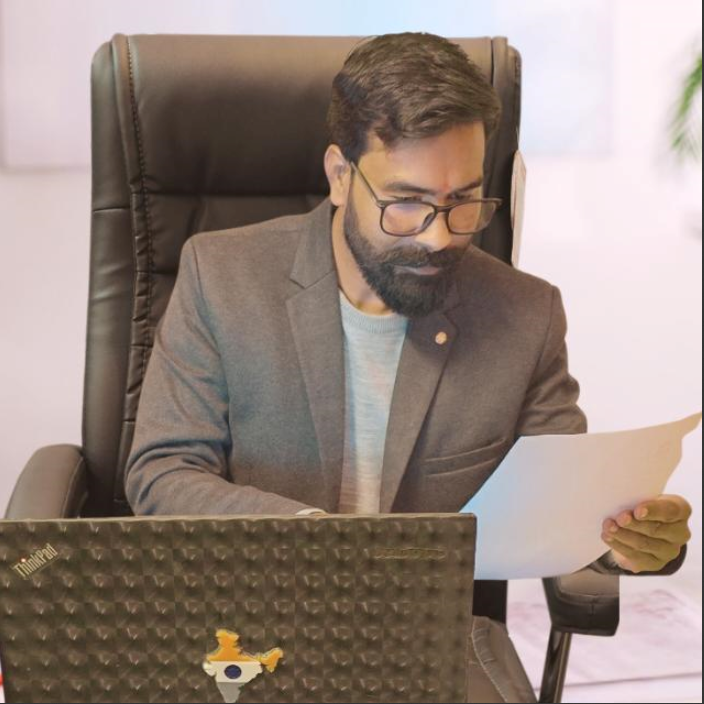 Rakesh Kumar teaching in an early classroom setting